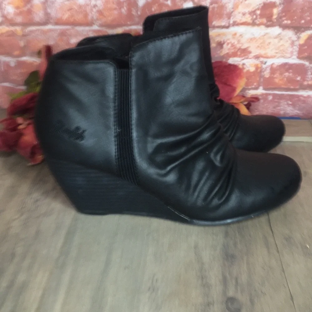 Blowfish’s Malibu Black Slouchy Faux Leather Wedge Ankle Booties